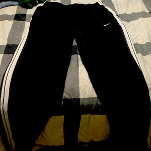 Black sweats with white strips size XL